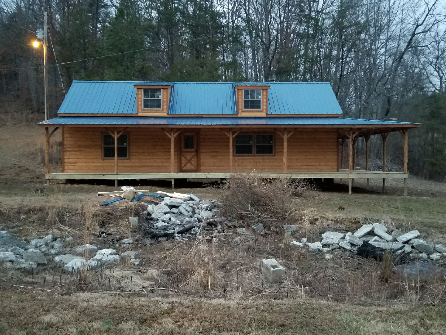Cabin with front and side porch