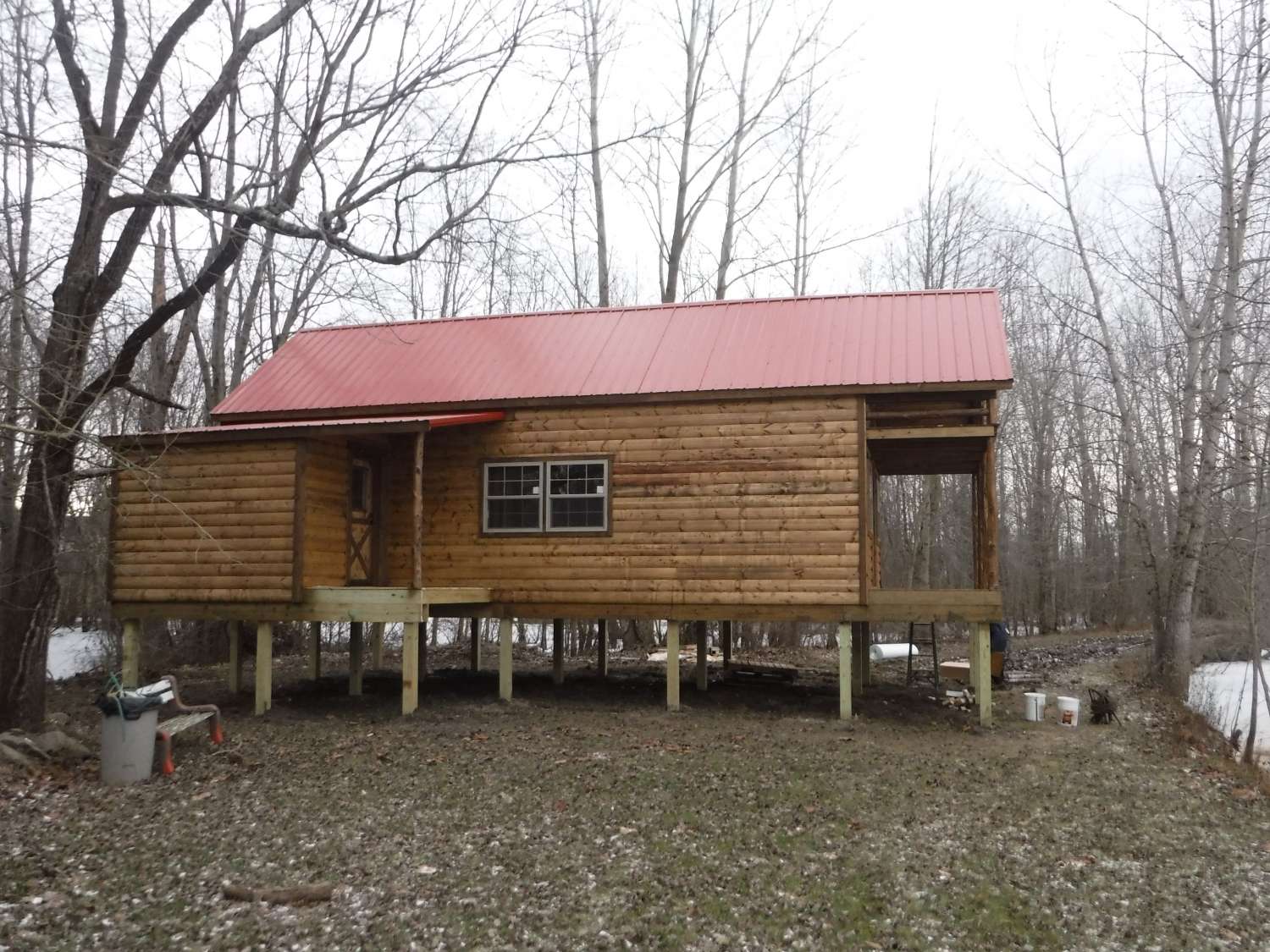 custom rustic red roof cabin